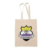 Load image into Gallery viewer, Natural coloured tote bag featuring a shield with a banner across it&#39;s front. Banner reads They of Honor. The background of the shield is the non binary pride flag and there is a jewel icon in the centre.