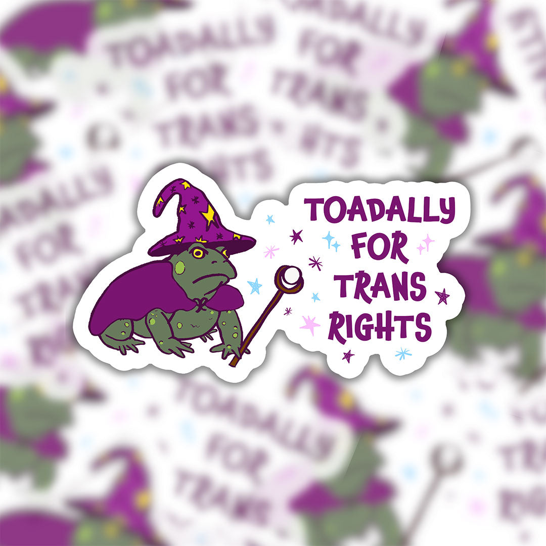 Toadally for Trans Rights wizard toad sticker centred over a blurred repeating background of the same purple, green and white sticker design.