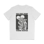 White crew neck shirt featuring the slogan And They Were Tomb Mates alongside a graphic of two skeletons embracing