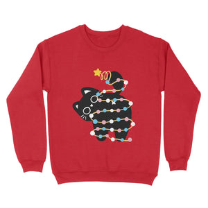 Red sweatshirt featuring a black cat wrapped in festive lights in the colours of the transgender pride flag, playfully lifting its tail with a star on top.