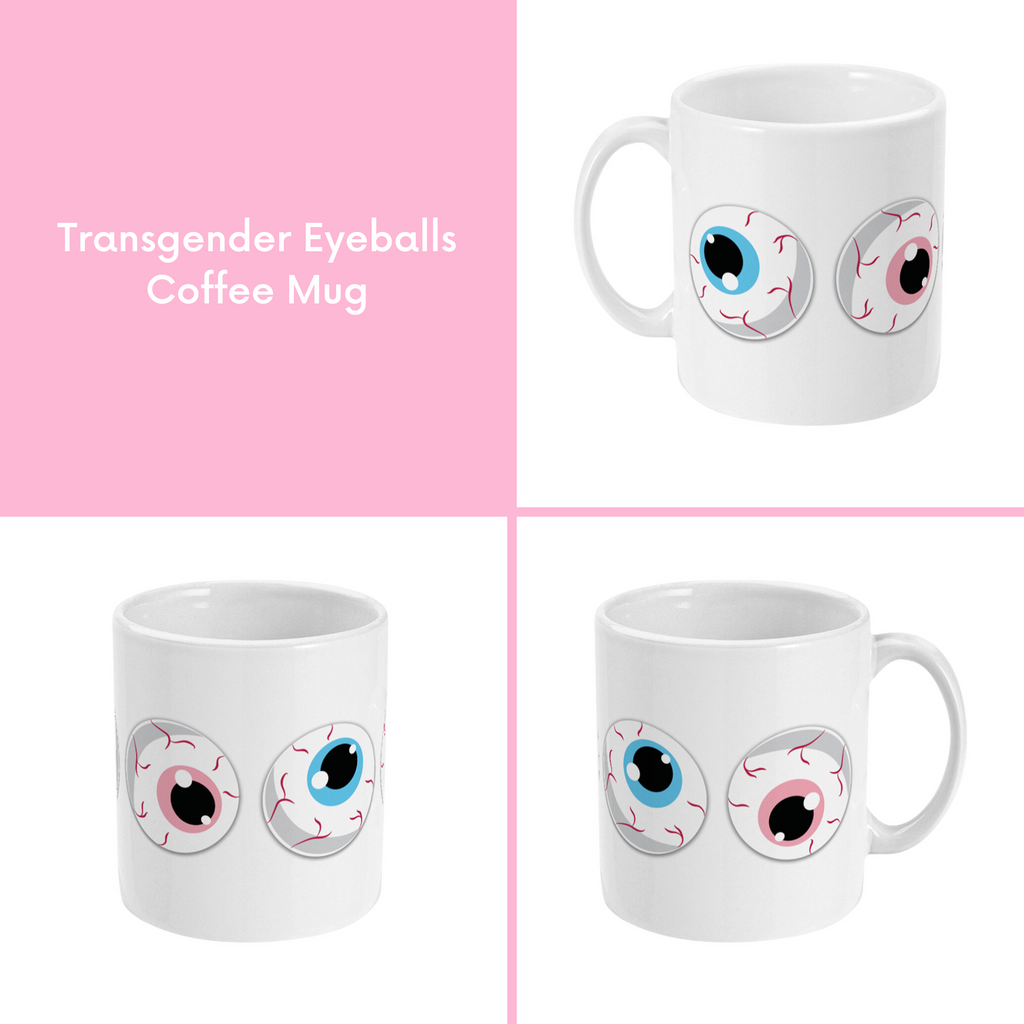 A composite image of a white coffee mug with a cartoon eyeball design in transgender pride flag colours.