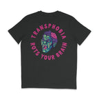 A dark heather grey t-shirt with a vibrant Halloween-themed design on the back. The design features a green zombie head with an exposed pink brain and the phrase "Transphobia Rots Your Brain" in bold, dripping pink letters surrounding the zombie. The text and image have a spooky, horror-inspired style.