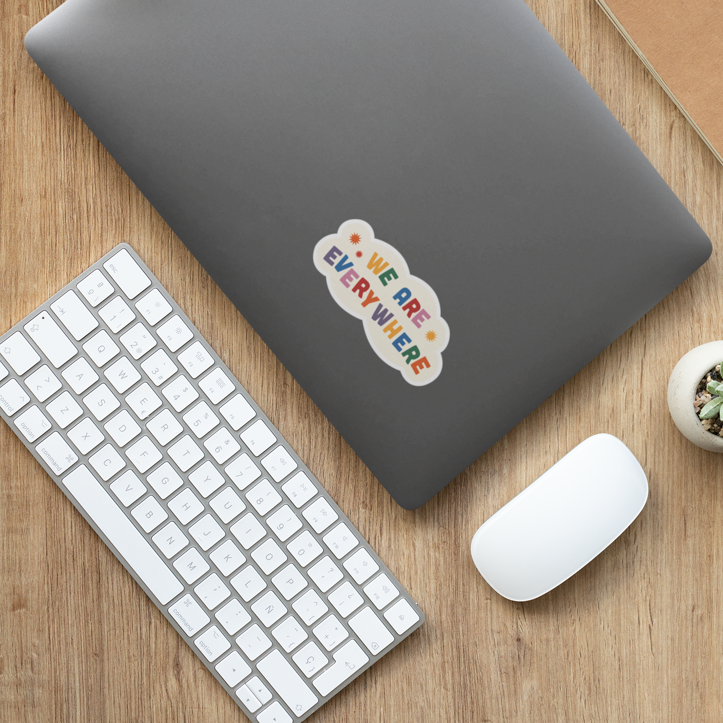 We Are Everywhere sticker on a laptop lid