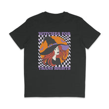 Load image into Gallery viewer, Dark Heather Grey crew neck shirt featuring the slogan Witches for Trans Rights with an illustrated graphic of a witch with bats flying around her hat