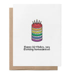 Happy Birthday, You Flaming Homosexual greeting card featuring a rainbow layer cake with candles above the humorous birthday message.