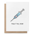 Happy T Day, Dude! greeting card featuring a syringe decorated in the colours of the transgender flag.
