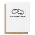 I'm So Happy We're Together LGBTQ+ greeting card featuring two linked carabiners above the message "I'm so happy we're together."