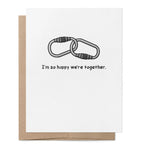 I'm So Happy We're Together LGBTQ+ greeting card featuring two linked carabiners above the message "I'm so happy we're together."