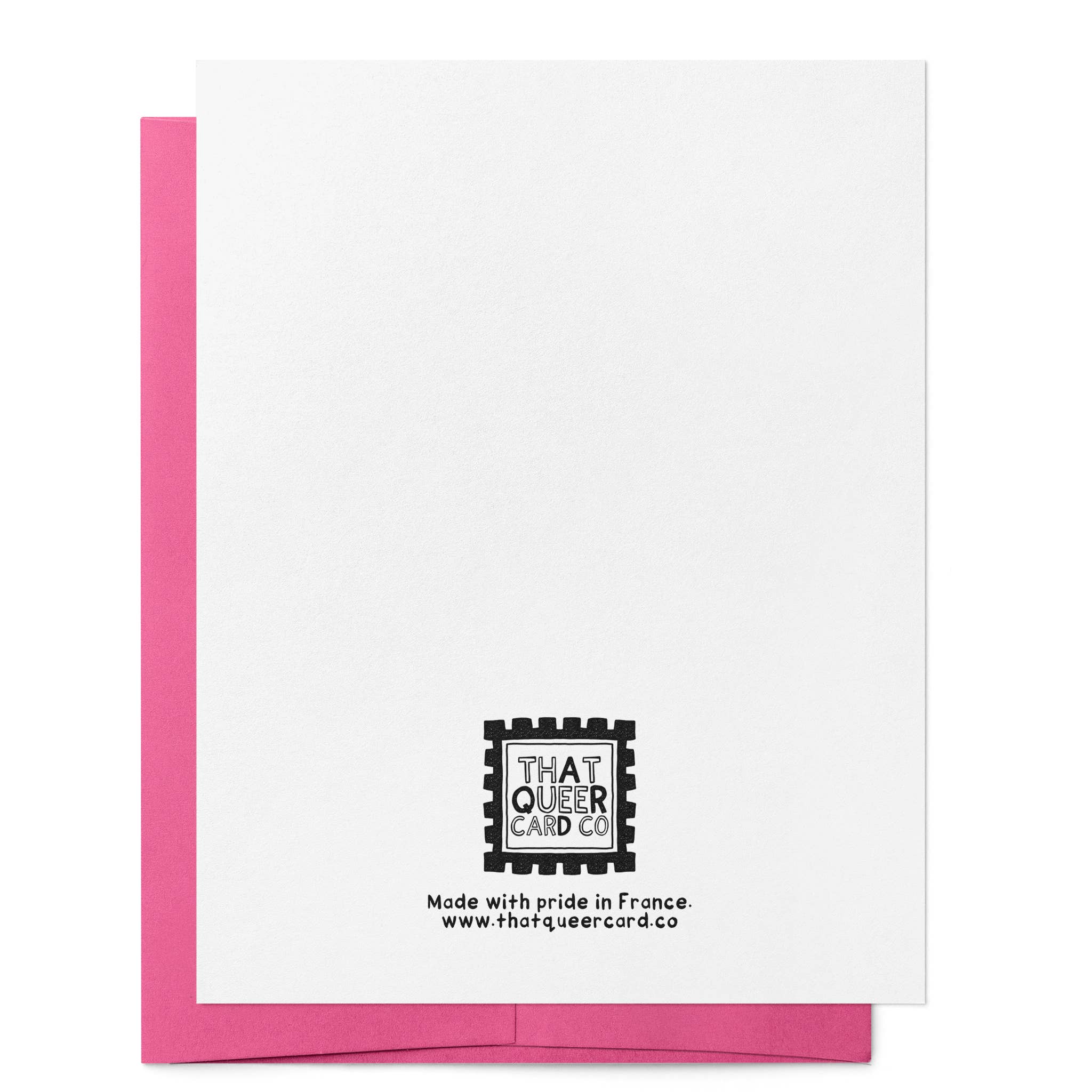 Back of greeting card showing the That Queer Card Co logo and branding on a plain white background with a pink envelope.