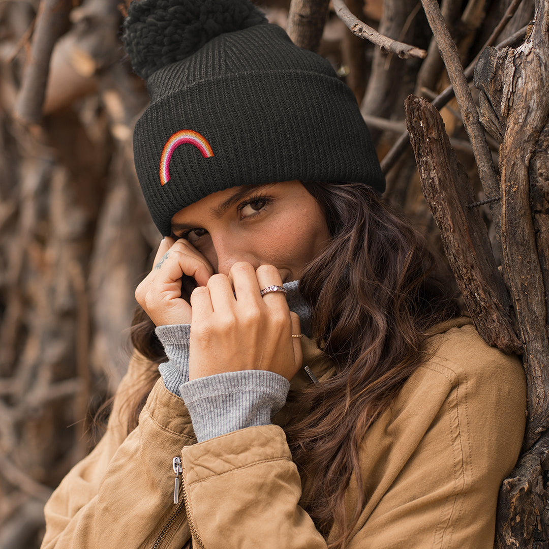 Woman Wearing Lesbian Rainbow Hat