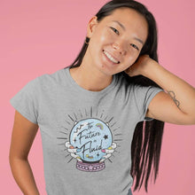 Load image into Gallery viewer, Young Woman Wearing The Future Is Fluid T Shirt | Rainbow &amp; Co