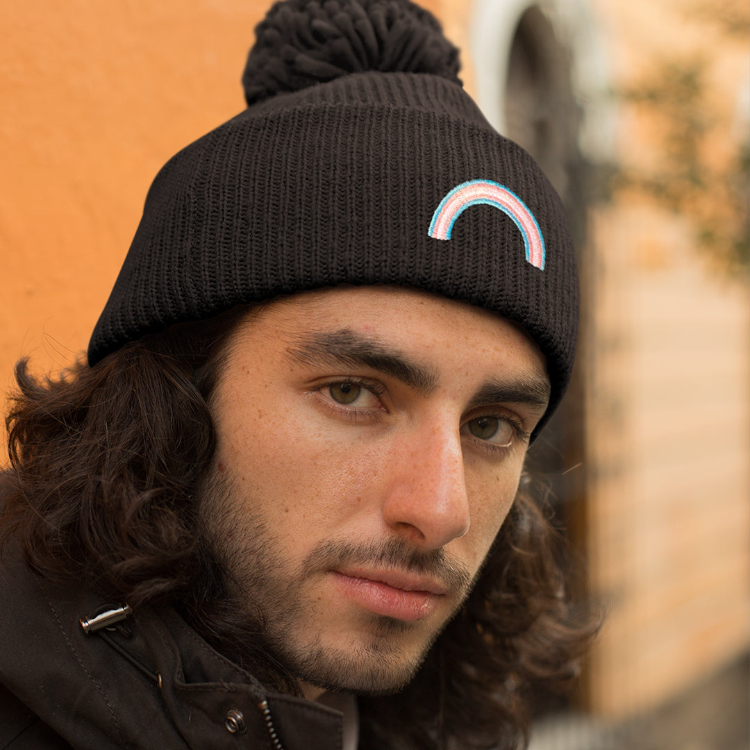 Man Wearing Transgender Pride Beanie | Rainbow & Co